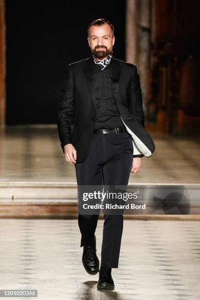 Designer Julien Fournie walks the runway during the Julien Fournie Haute Couture Spring/Summer 2020 show at Oratoire du Louvre as part of Paris...