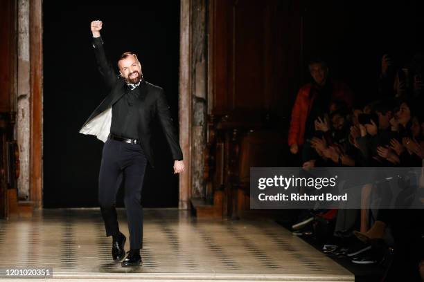 Designer Julien Fournie walks the runway during the Julien Fournie Haute Couture Spring/Summer 2020 show at Oratoire du Louvre as part of Paris...