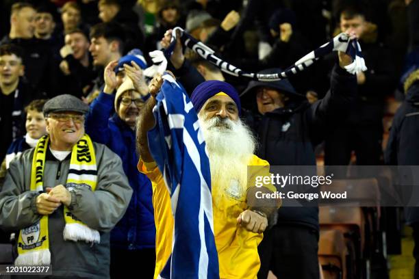 Preston North End fan celebrates during the Sky Bet Championship match between Barnsley and Preston North End at Oakwell Stadium on January 21, 2020...