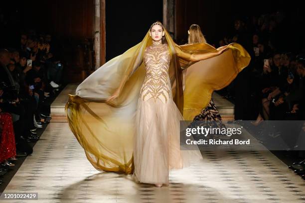 Model walks the runway during the Julien Fournie Haute Couture Spring/Summer 2020 show at Oratoire du Louvre as part of Paris Fashion Week on January...