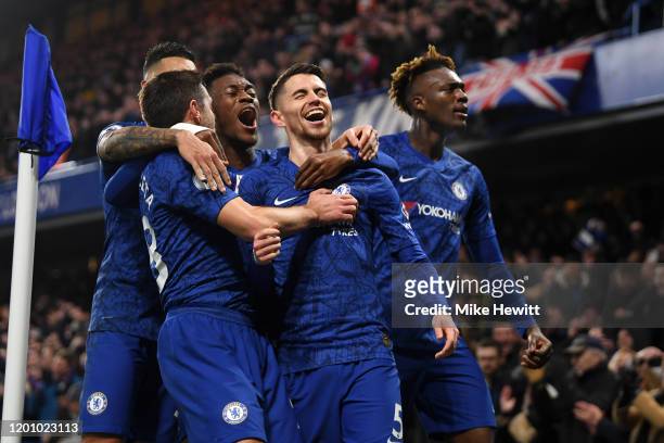 Jorginho of Chelsea celebrates with Cesar Azpilicueta , Callum Hudson-Odoi and Tammy Abraham of Chelsea after scoring his team's first goal during...