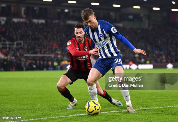 Solomon March of Brighton and Hove Albion holds off Adam Smith of AFC Bournemouth during the Premier League match between AFC Bournemouth and...