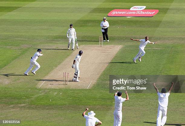 Stuart Broad of England celebrates taking his hat trick with the wicket of Praveen Kumar of India during the second npower Test match between England...