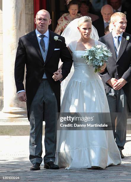 Zara Phillips and Mike Tindall attend their wedding at Canongate Kirk, in Edinburgh on July 30, 2011 in Edinburgh, Scotland.