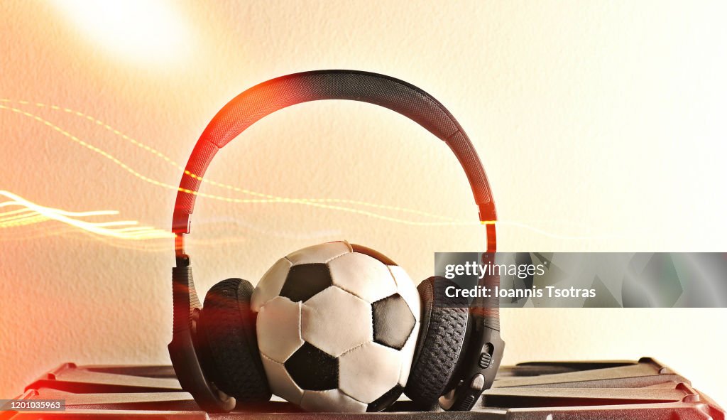 Football ball with headphones