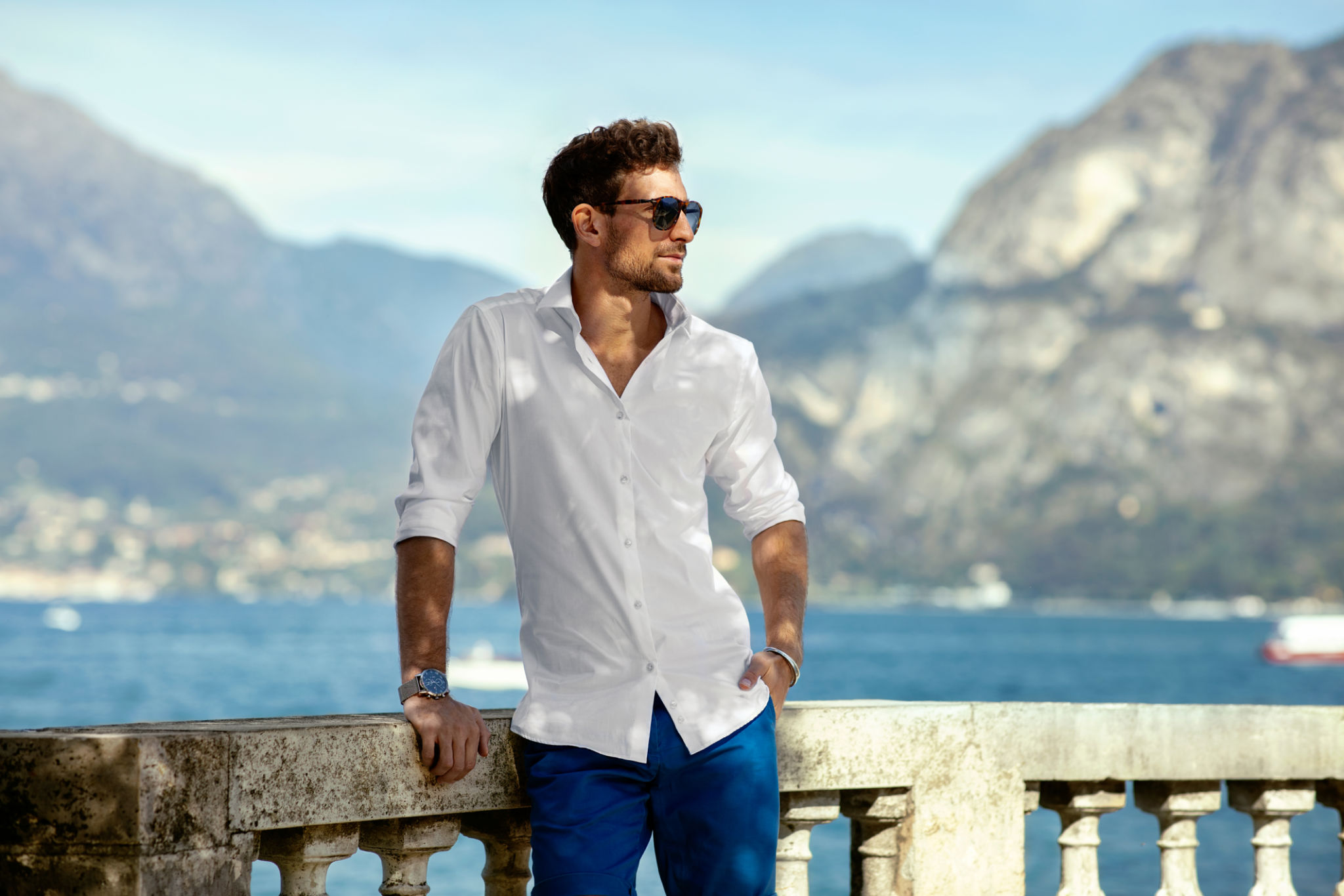 Young Handome man in white shirt relaxing Young Handome man in white shirt relaxing