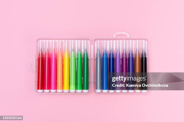 a set of multi-colored markers arranged diagonally on a pink millennial background. the concept of education and creativity.flat lay - permanent marker stock pictures, royalty-free photos & images