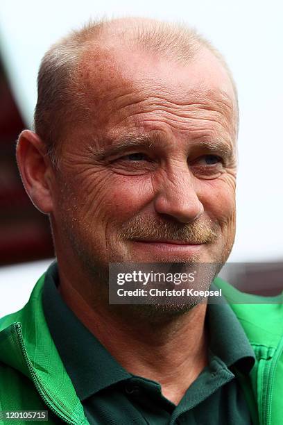 Thomas Schaaf of Bremen looks on prior to the first round DFB Cup match between 1. FC Heidenheim and Werder Bremen at Voith-Arena on July 30, 2011 in...