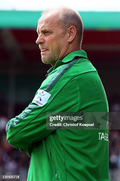 Thomas Schaaf of Bremen looks on prior to the first round DFB Cup match between 1. FC Heidenheim and Werder Bremen at Voith-Arena on July 30, 2011 in...