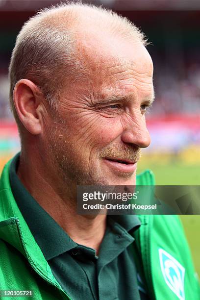Thomas Schaaf of Bremen looks on prior to the first round DFB Cup match between 1. FC Heidenheim and Werder Bremen at Voith-Arena on July 30, 2011 in...