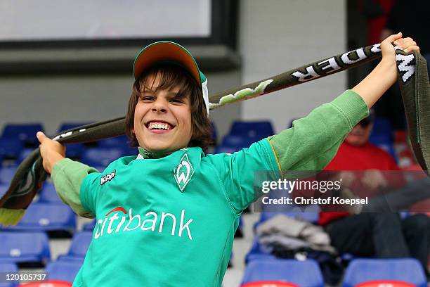 Fan of Bremen poses prior to the first round DFB Cup match between 1. FC Heidenheim and Werder Bremen at Voith-Arena on July 30, 2011 in Heidenheim,...