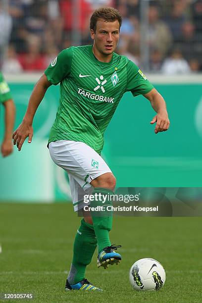 Philipp Bargfrede of Bremen runs with the ball during the first round DFB Cup match between 1. FC Heidenheim and Werder Bremen at Voith-Arena on July...