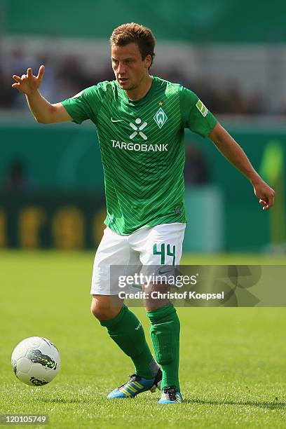 Philipp Bargfrede of Bremen runs with the ball during the first round DFB Cup match between 1. FC Heidenheim and Werder Bremen at Voith-Arena on July...