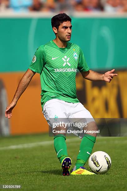 Memo Ekici of Bremen runs with the ball during the first round DFB Cup match between 1. FC Heidenheim and Werder Bremen at Voith-Arena on July 30,...