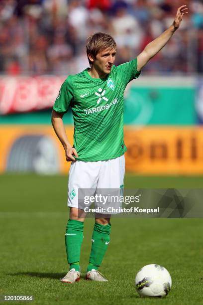 Marko Marin of Bremen issues instructions during the first round DFB Cup match between 1. FC Heidenheim and Werder Bremen at Voith-Arena on July 30,...