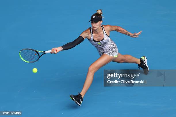 Polona Hercog of Slovenia plays a forehand during her Women's Singles second round match against Ashleigh Barty of Australia on day three of the 2020...