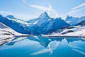 Switzerland, reflection of Firist Bachalsee Lake.