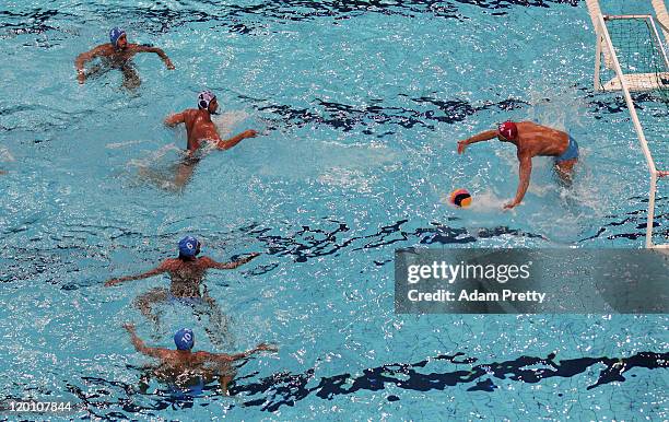 Stefano Tempesti of Italy makes a save from Vanja Udovicic of Serbia in the Men's Water Polo gold medal match between Serbia and Italy during Day...