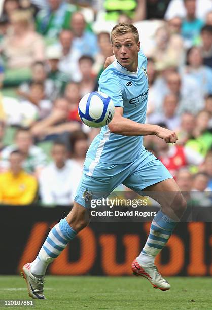 John Guidetti of Manchester City controls the ball during the Dublin Super Cup match between Manchester City and Airtricity XI at Aviva Stadium on...