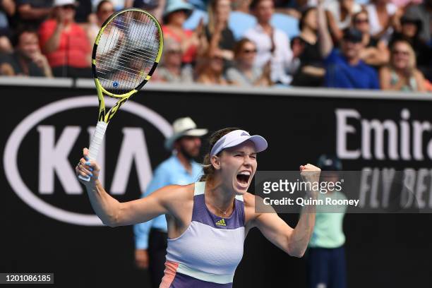 Caroline Wozniacki of Denmark celebrates after winning match point during her Women's Singles second round match against Dayana Yastremska of Ukraine...