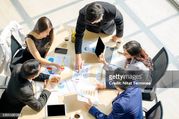 group of asian business people working in the office. business people working and meeting concept. - shareholder's meeting bildbanksfoton och bilder