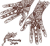 decorative hands with henna tattoos