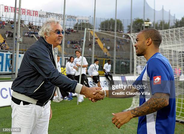 President Flavio Briatore of Queens Park Rangers shakes hands with Kieron Dyer during the Trofeo Bortolotti match between Queens Park Rangers and SC...