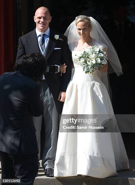Zara Phillips and England rugby player Mike Tindall leave the church after their marriage to at Canongate Kirk on July 30, 2011 in Edinburgh,...