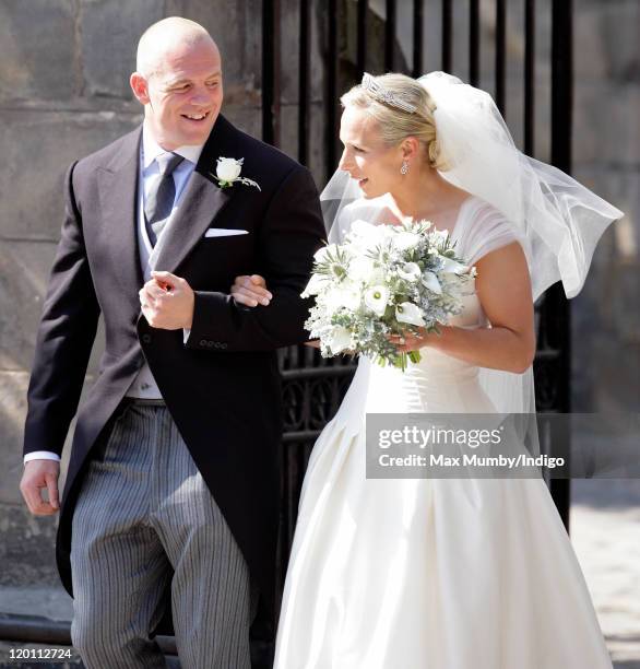 Mike Tindall and Zara Phillips leave Canongate Kirk after their wedding on July 30, 2011 in Edinburgh, Scotland. The Queen's granddaughter Zara...