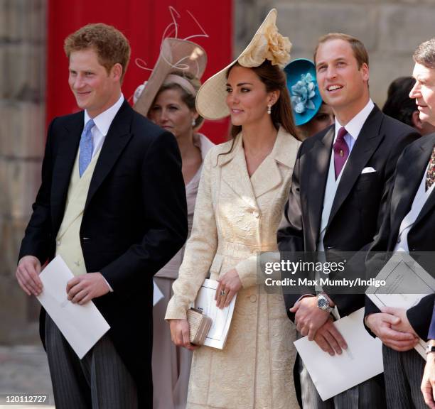 Prince Harry, Catherine, Duchess of Cambridge and Prince William, Duke of Cambridge attend the wedding of Zara Phillips and Mike Tindall at Canongate...