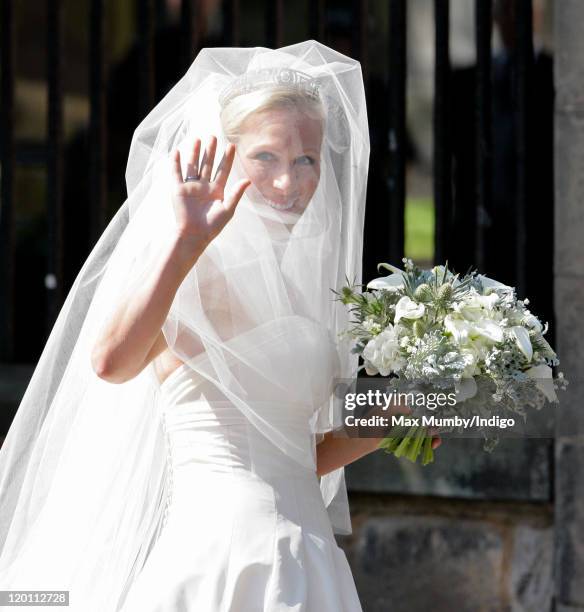 Zara Phillips waves as she arrives at Canongate Kirk for her wedding to Mike Tindall on July 30, 2011 in Edinburgh, Scotland. The Queen's...