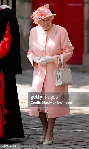 Queen Elizabeth II attends the wedding of Zara Phillips and Mike Tindall at Canongate Kirk on July 30, 2011 in Edinburgh, Scotland. The Queen's...