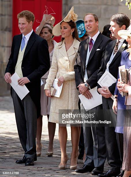 Prince Harry, Catherine, Duchess of Cambridge and Prince William, Duke of Cambridge attend the wedding of Zara Phillips and Mike Tindall at Canongate...