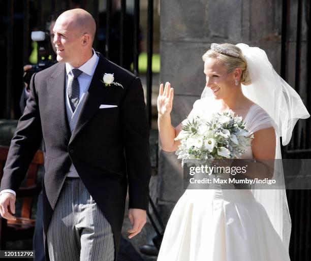 Mike Tindall and Zara Phillips leave Canongate Kirk after their wedding on July 30, 2011 in Edinburgh, Scotland. The Queen's granddaughter Zara...