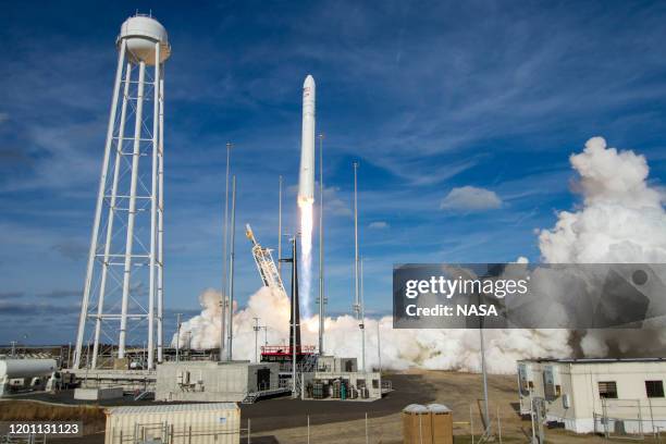 The Northrop Grumman Antares rocket, with Cygnus resupply spacecraft onboard, launches from Pad-0A on February 15, 2020 at NASA's Wallops Flight...