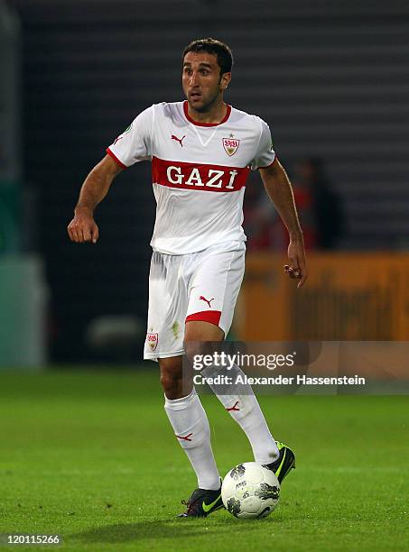 Cristian Molinaro of Stuttgart runs with the ball during the DFB Pokal first round match between SV Wehen-Wiesbaden and VfB Stuttgart at Brita Arena...