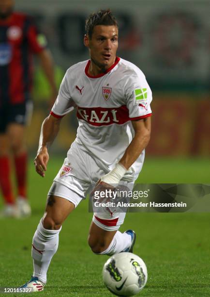 Stefano Celozzi of Stuttgart runs with the ball during the DFB Pokal first round match between SV Wehen-Wiesbaden and VfB Stuttgart at Brita Arena on...