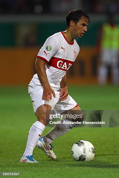 Tamas Hajnal of Stuttgart runs with the ball during the DFB Pokal first round match between SV Wehen-Wiesbaden and VfB Stuttgart at Brita Arena on...