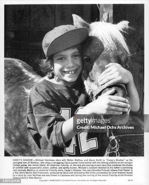 Michael Hershewe with colt in a scene from the film 'Casey's Shadow', 1978.
