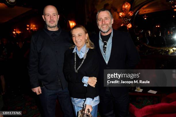 Jake Chapman, Miuccia Prada and David Sims attend the dinner co-hosted by Prada and Vogue Paris on January 19, 2020 in Paris, France.
