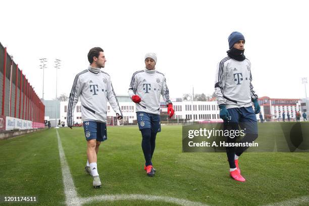 Alvaro Odriozola of FC Bayern Muenchen arrives with his team mates Thiago Alcantara and Philippe Coutinho for a training session at Saebener Strasse...