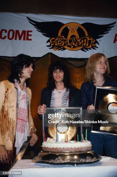 Aerosmith reception party at the Takanawa Hotel in Tokyo, Japan, 31st January 1977. Joe Perry, Steven Tyler, Tom Hamilton.