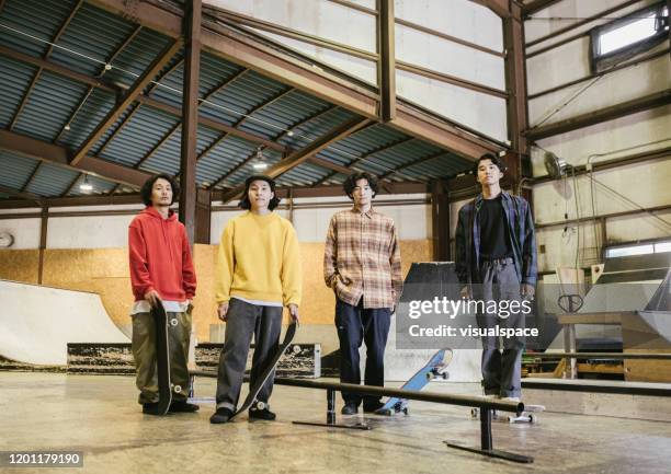 group of skateboarders - fashion design minimalist edgy stock pictures, royalty-free photos & images