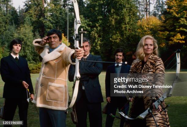 Ray Danton, Donnelly Rhodes, Sharon Acker, extras appearing in the ABC tv movie 'Our Man Flint: Dead on Target'.