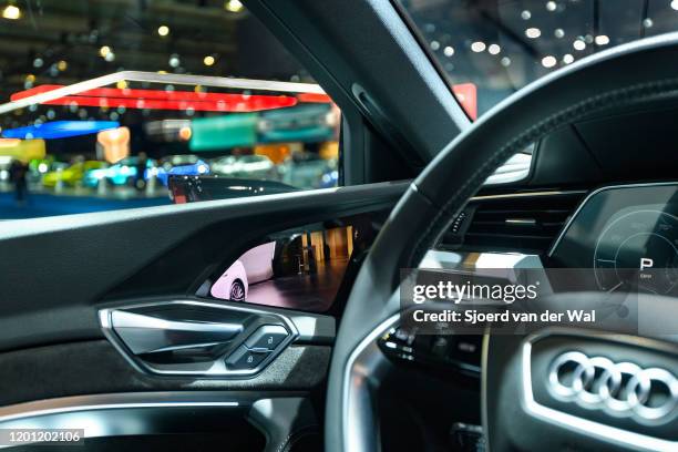 Camera rear view mirror on an Audi e-tron 55 Quattro full electric luxury crossover SUV car on display at Brussels Expo on January 9, 2020 in...