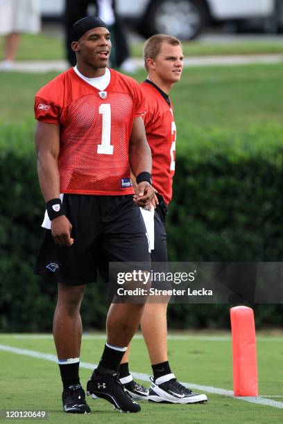 Teammates Cam Newton and Jimmy Clausen of the Carolina Panthers workout during training camp at Wofford College on July 30, 2011 in Spartanburg,...