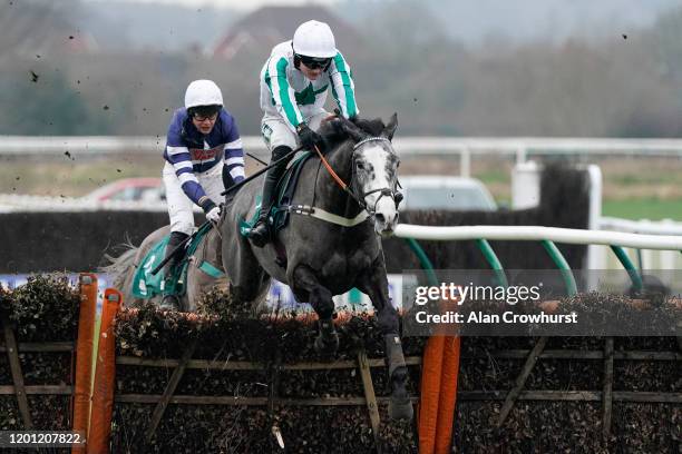 Tom Bellamy riding Blacko clear the last to win The Try Racing TV For Free Now Juvenile Hurdle at Warwick Racecourse on January 22, 2020 in Warwick,...