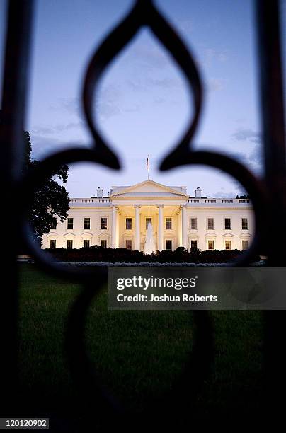 View of the White House is photographed through the gate on July 30, 2011 in Washington, DC. Republican leaders held fresh talks with U.S. President...