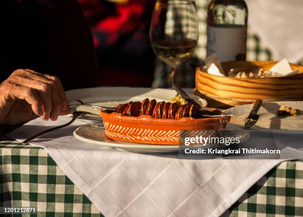 chouriço à bombeiro, or flame grilled chouriço. - bombeiro stock pictures, royalty-free photos & images