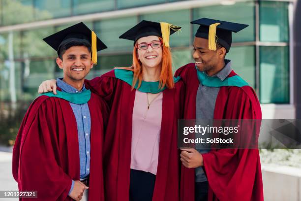 our friendship has helped get us here - free graduation stock pictures, royalty-free photos & images